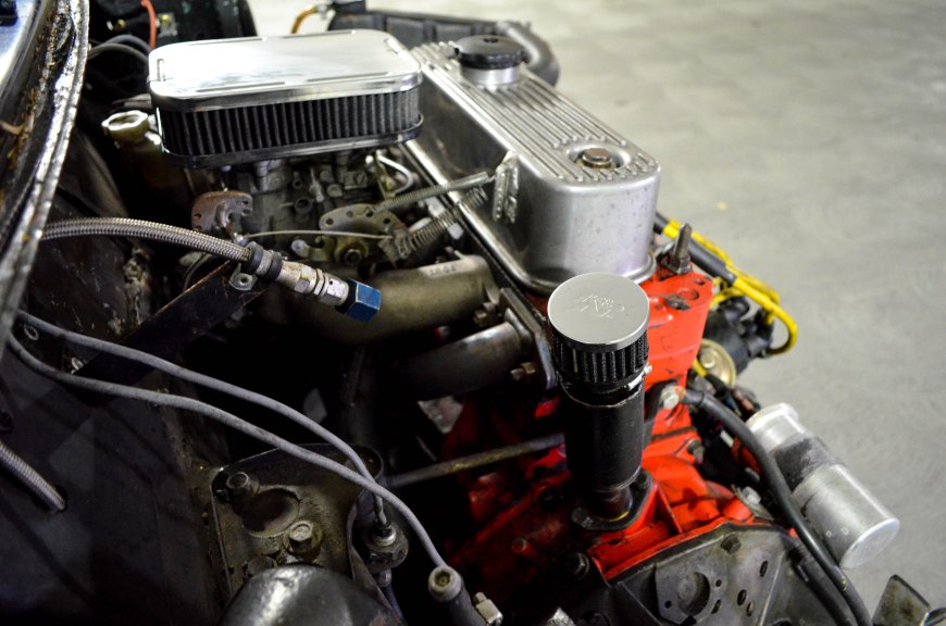 The side view reveals a better view of the Weber DGV carb and LCB headers. The blue a/n fitting is for the fire system.