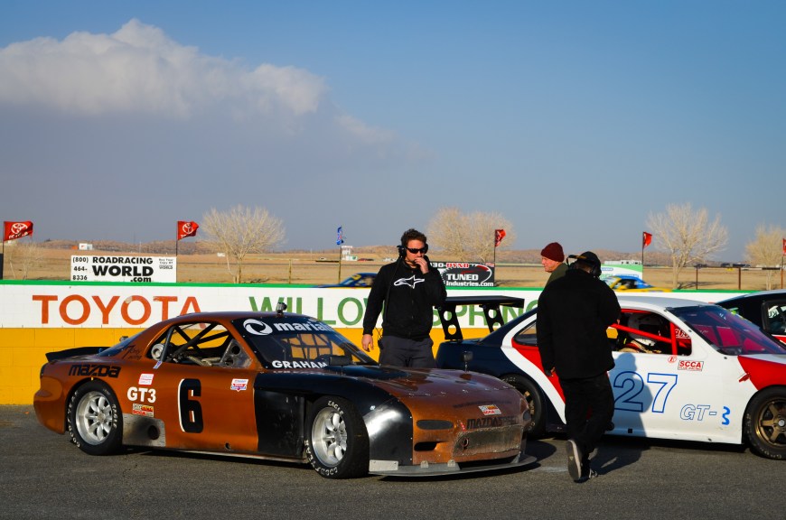 Teammate and friend Scott G. in a tube frame GT3 Rx7. Perif ported 13b puting out a clean 300hp. Surrounding the car, Dan and Max, some of the best mechanics around.
