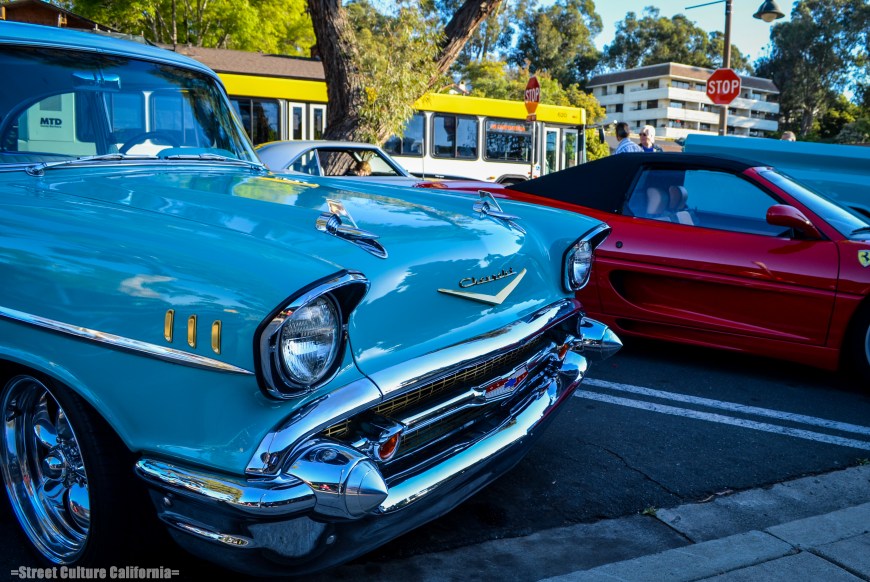 A '57 BelAir next to a Ferrari 355 Spider