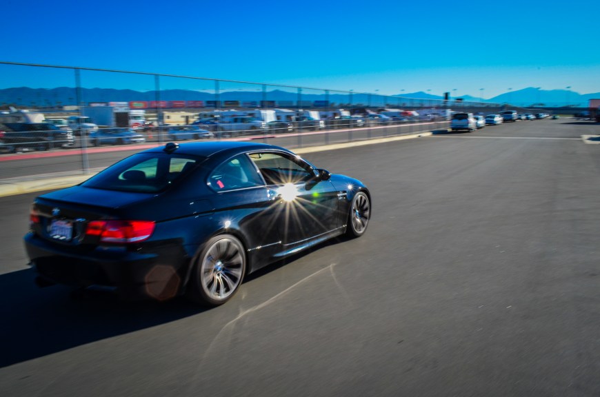 Riding on my skateboard (soon after I was chewed out by an official for riding it) I saw an M3 driving by so I snapped a shot of it.