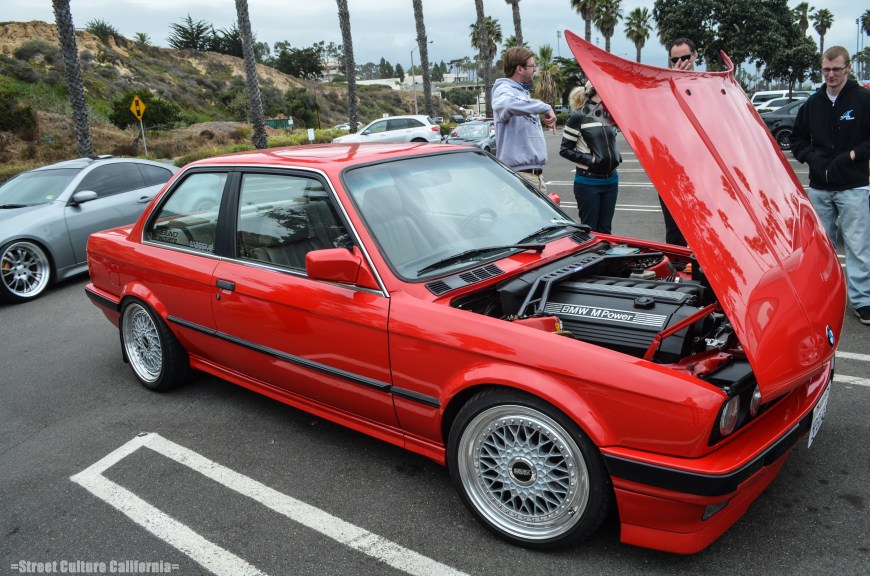 An hour or two after the festivities began, an red e30 showed up and soon popped his hood. Why? This is why: a straight six from I believe was an e46 M3.