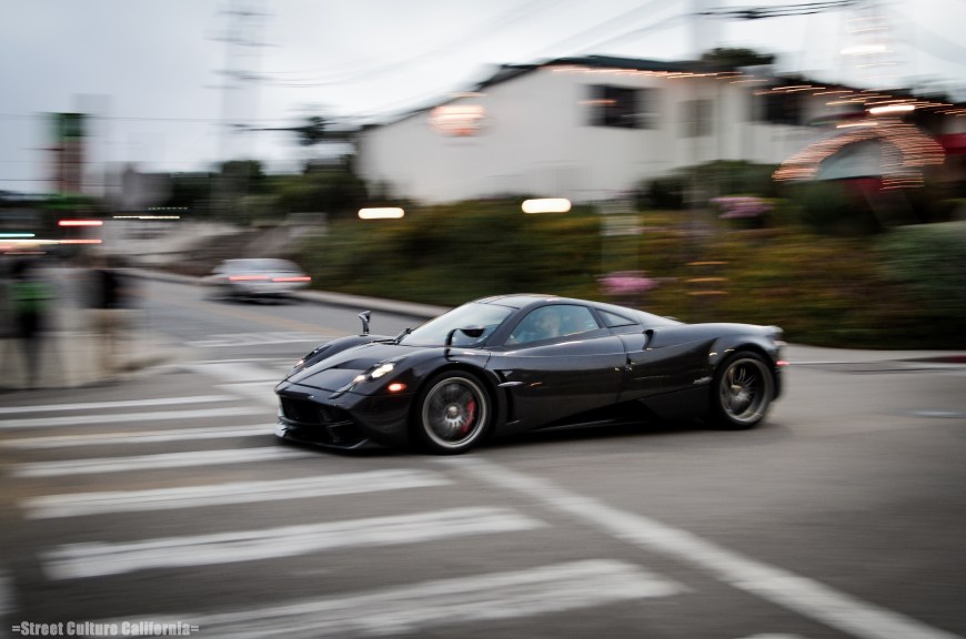 Highlight of the day: The new Pagani Huayra (or however it's spelled). I saw one parked at Pebble Beach last year, but to see one on the move was a whole other story.